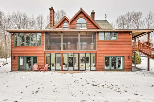 a large brick house with a deck on it at Cabin on Lake Superior about 11 Mi to Bayfield! in Washburn