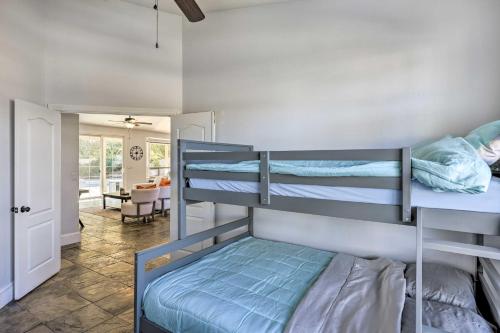 a bedroom with two bunk beds in a room at Tee Off, Relax Poolside! Family Home in Scottsdale in Scottsdale