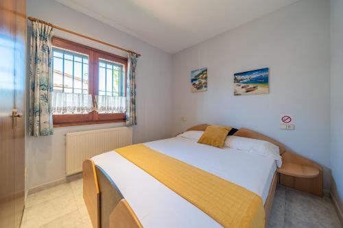 Posteľ alebo postele v izbe v ubytovaní Holiday Home Mila