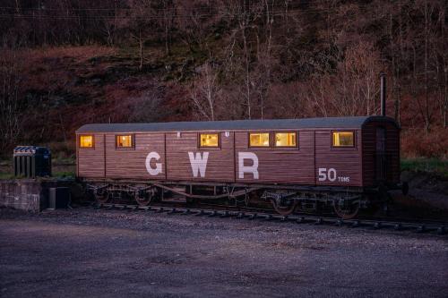 a train car with the words go wrong written on it at Appin Holiday Homes -Caravans, Lodges, Shepherds Hut and Train Carriage stays in Appin