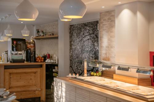 a kitchen with a counter and a counter top at Elia Kentron in Chania Town