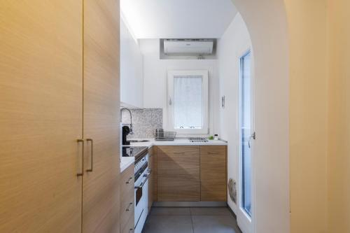 Η κουζίνα ή μικρή κουζίνα στο La Suite di Piazza dell'Università