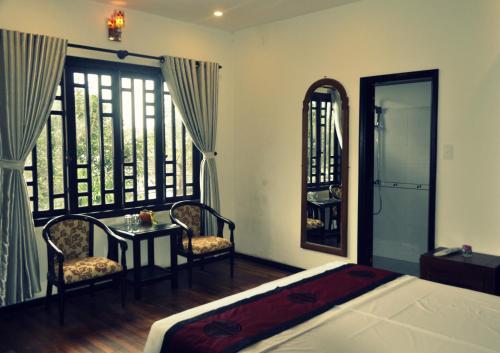 Imagen de la galería de Green CoCo HomeStay, en Hoi An