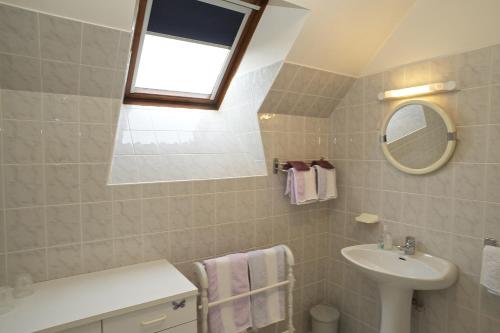 Ванна кімната в Chambres d'Hotes Les Sageais
