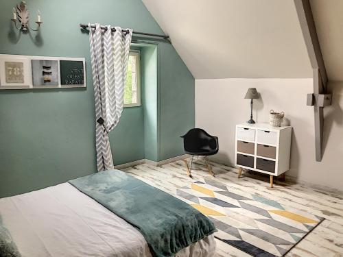 Ένα ή περισσότερα κρεβάτια σε δωμάτιο στο les demeures de Kerbosser