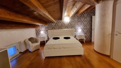 Postel nebo postele na pokoji v ubytování B&B Palazzo del Contestabile