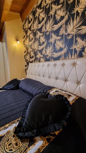 Postel nebo postele na pokoji v ubytování B&B Palazzo del Contestabile