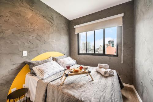 Ένα ή περισσότερα κρεβάτια σε δωμάτιο στο AQ1215 Apartamento confortável na Bela Vista