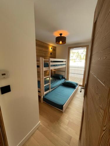 Katil dua tingkat atau katil-katil dua tingkat dalam bilik di les Airelles 202