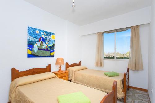Postel nebo postele na pokoji v ubytování Sensacional piso junto al mar