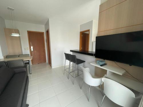 Posezení v ubytování Flat 405 - Condomínio Veredas do Rio Quente - Diferenciado com ar na sala e no quarto