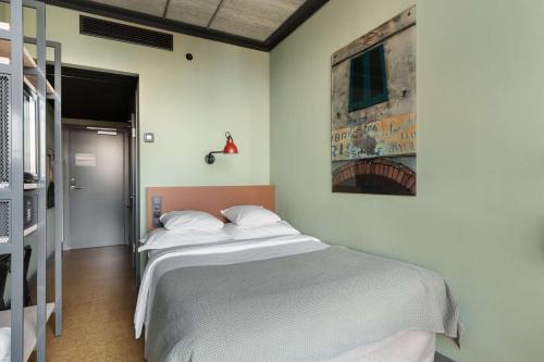 Una cama o camas en una habitación de The Winery Hotel, WorldHotels Crafted