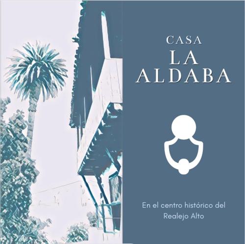 uma capa de livro de la alba com uma palmeira em Casa La Aldaba em Los Realejos