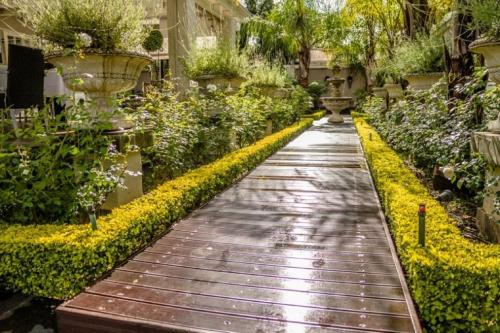 Jardin de l'établissement Touch of Class Guest House