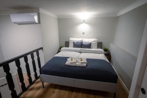 Postel nebo postele na pokoji v ubytování Casa Wesselenyi - Cosy Apartments in the city center