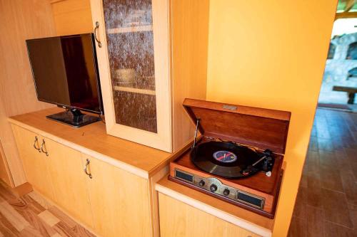 a small room with a tv and a dvd player at Holiday home in Dobrnic - Dolenjska & Bela krajina Unter- & Weißkrain 26093 in Dobrnič