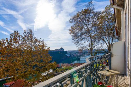 a balcony with a view of a city at Fontainhas River Residence in Porto