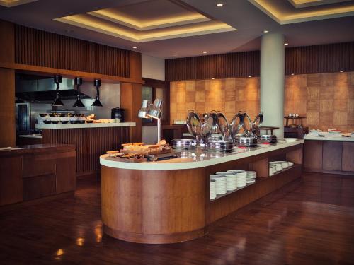 a kitchen with a counter with food on it at Elevate Bali in Munduk