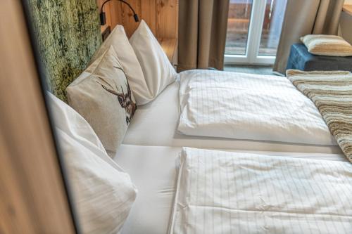 Un ou plusieurs lits dans un hébergement de l'établissement Jugendhotel Gruber