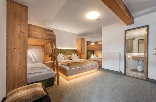 Postel nebo postele na pokoji v ubytování Jugendhotel Gruber