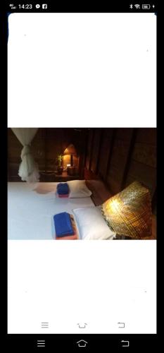 Katil atau katil-katil dalam bilik di Happy bungalow & trekking