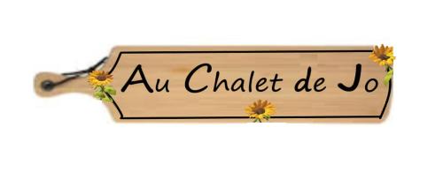 a sign with the words aw buffet de at Au chalet de JO avec accès à l'espace piscine et jacuzzi in Muhlbach-sur-Munster