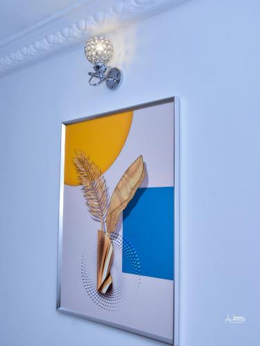 Photo de la galerie de l'établissement NAIVELI-PALM Appartement meublé sobre et chic, à Douala