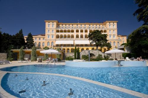 a large pool in front of a large building at Apartment in Dramalj with sea view, balcony, air conditioning, WiFi 4623-3 in Dramalj