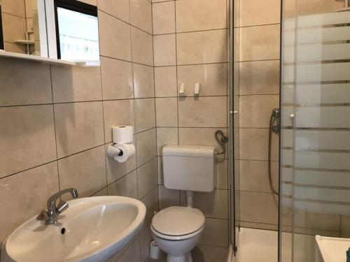 Koupelna v ubytování Apartment in Lopar with sea view, terrace, air conditioning, WiFi 4607-1