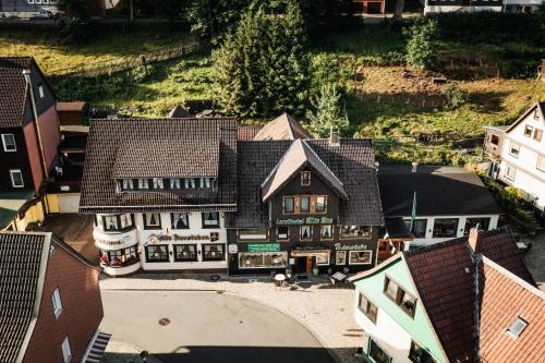 an overhead view of a building in a town at Landhotel Alte Aue in Altenau