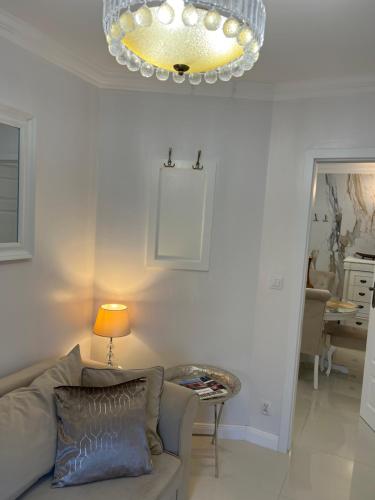 Χώρος καθιστικού στο Apartament Parys Gold