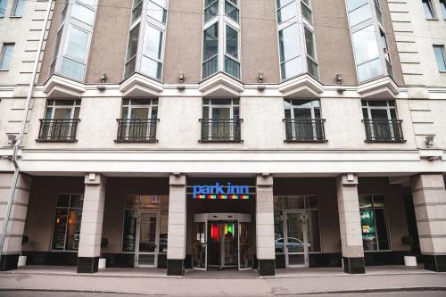 a tall building with a sign on the front of it at Park Inn by Radisson Nevsky in Saint Petersburg