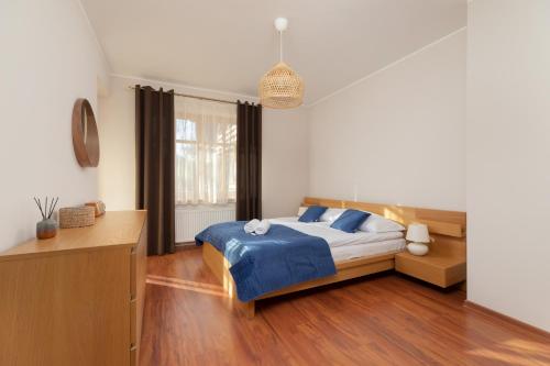 Posteľ alebo postele v izbe v ubytovaní Kaszelewskiego Apartment Zakopane by Noclegi Renters