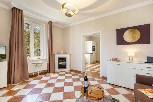 a living room with a checkered floor at Villa Quisisana in Binz