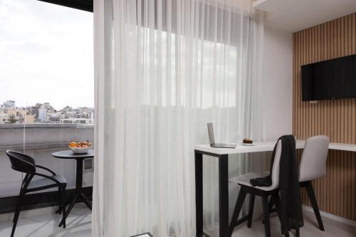TV a/nebo společenská místnost v ubytování Incanto Boutique Suites - Mets