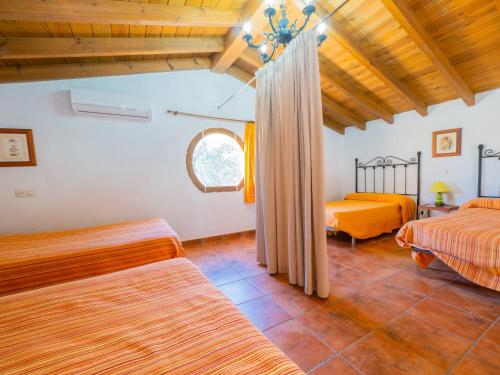 A bed or beds in a room at Cubo's Finca La Curva