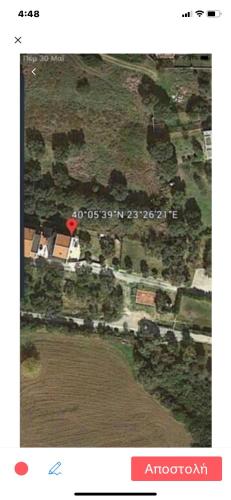 a screenshot of an aerial view of a house at Villa Evita Garden Floor Suite in Afitos