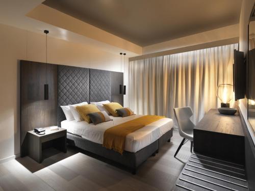 Cama ou camas em um quarto em B&B Baciami Ancora
