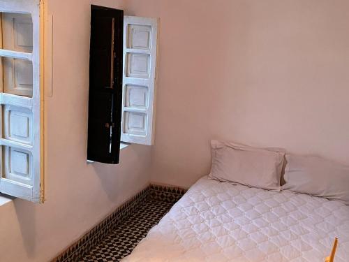 Postel nebo postele na pokoji v ubytování Riad TaTam House