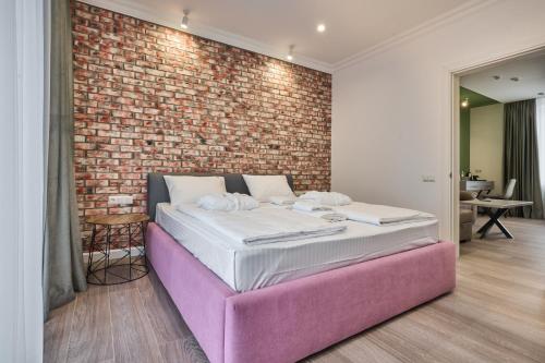 Postel nebo postele na pokoji v ubytování Olimp Hotel