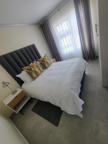 Domsa Lapeng Guesthouseにあるベッド