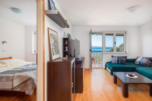 Posteľ alebo postele v izbe v ubytovaní Sunny Vista Apartment