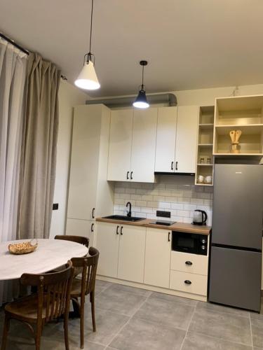  Loft Aparts -  Room  picture :   Tea/Coffee maker    Shower    TV                           