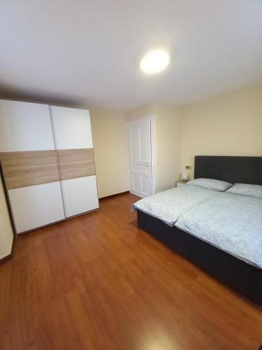 Postel nebo postele na pokoji v ubytování Appartamento Sophie LT