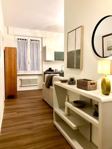 a living room with a couch and a table at Palazzo Penco Apartment in Genoa
