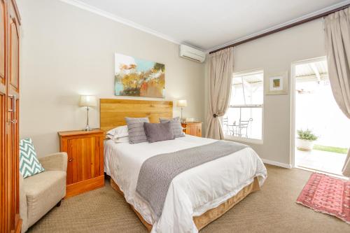 A bed or beds in a room at The Ashford