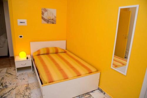 Voodi või voodid majutusasutuse Note di Colore toas