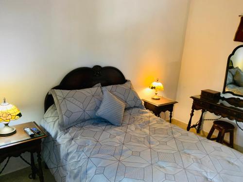 Ένα ή περισσότερα κρεβάτια σε δωμάτιο στο La Casa de Leo Recamara 1 Villa Cardiell QROO