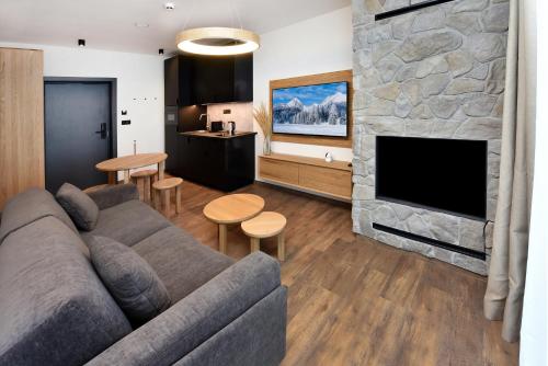 TV in/ali zabaviščno središče v nastanitvi APLEND Hotel Ovruč