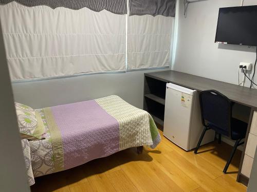 Una cama o camas en una habitación de Residencial la Casa de Millan